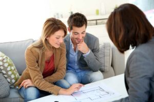 Couple meeting architect for home remodel